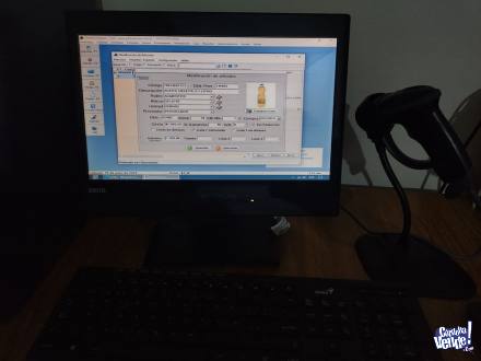 Computadora con sistema de control de stock y ventas.