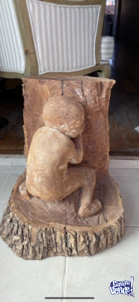 ESCULTURA “Bebe Escondido” tallada en madera de Calden