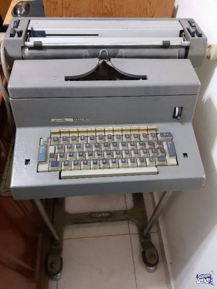 Maquina de Escribir Eléctrica Olivetti Tekne 3 con mesita