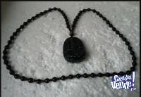 Gran conjunto de collar y medallon tallado en obsidiana. Inc