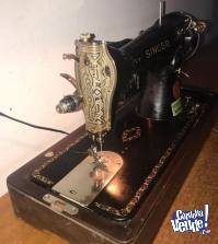 Maquina de coser Singer eléctrica antigua, caja y accesorio