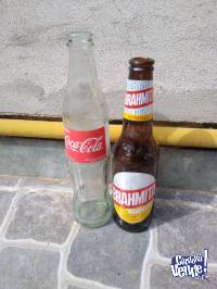 Botellas de Coca Cola y Cerveza