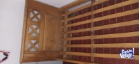 Por mudanza vendo cama de madera 1 plaza + 2 colchones de 1 plaza 