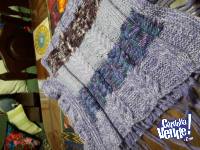 Ponchos tejidos a mano con trenzas en lana en las mejores la